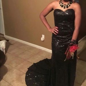Black sequined covered prom dress with train